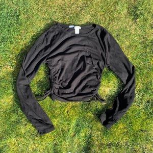 black long sleeve shirt with ties on the sides from “bozzolo”